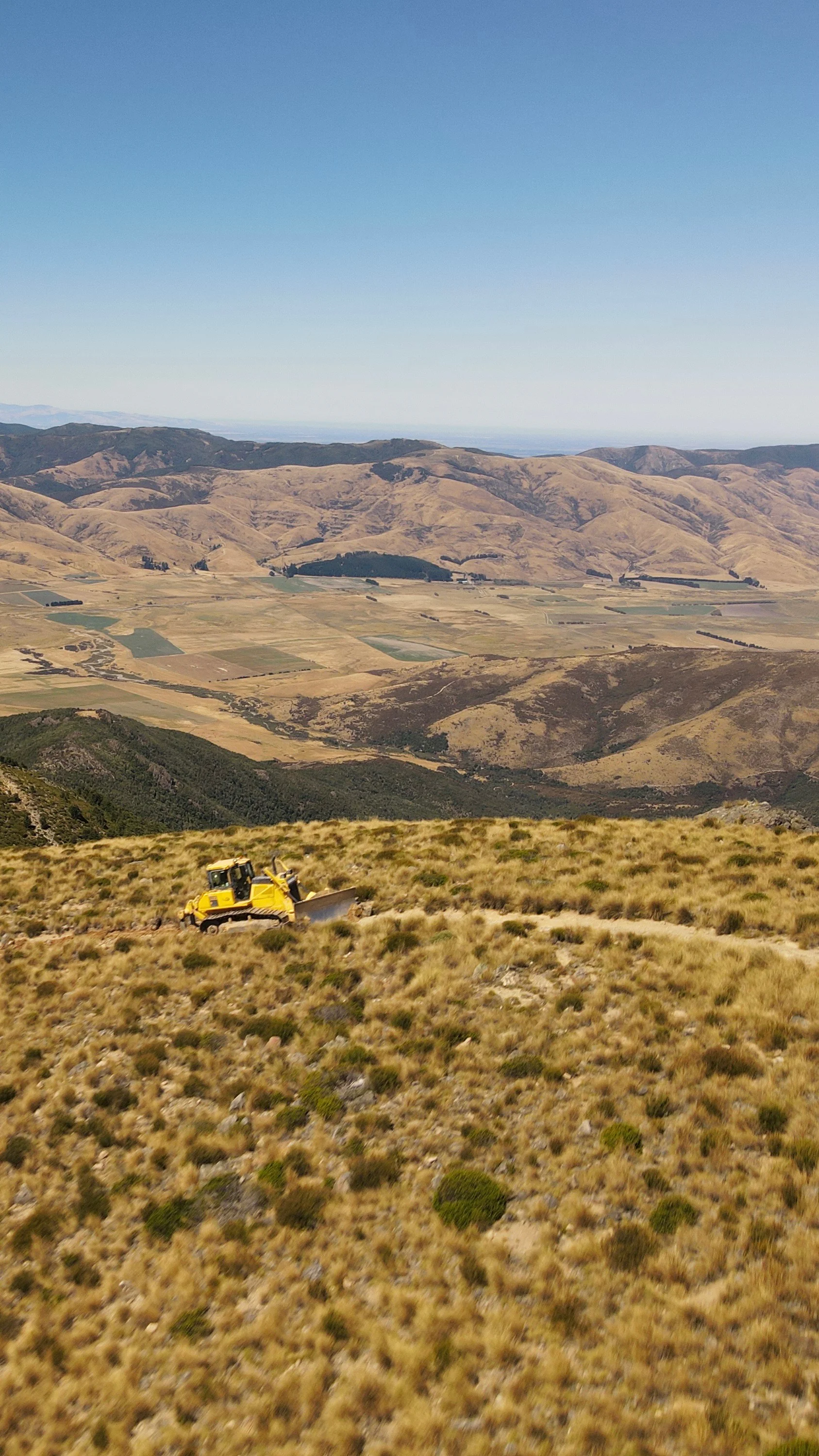 Heavy-duty earthworks machinery working on Canterbury station land